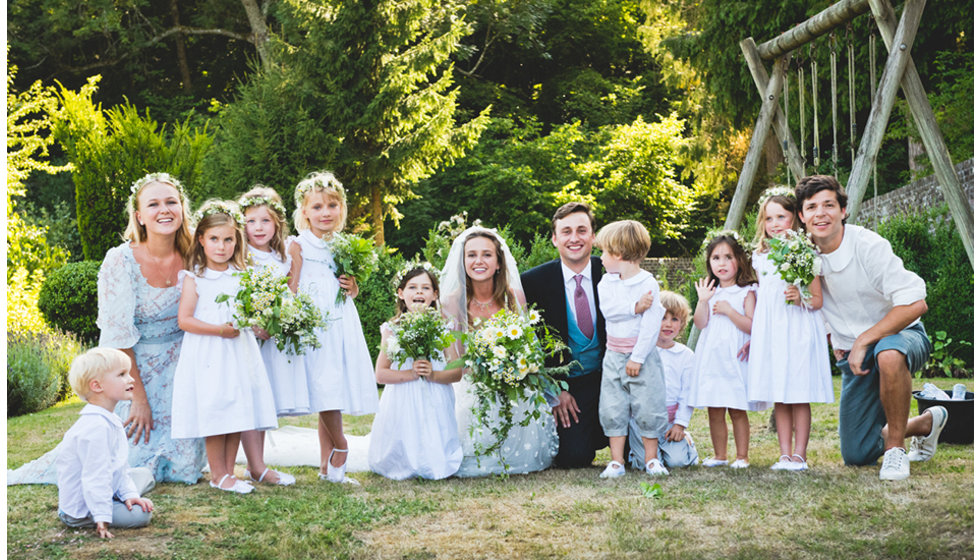 Daisy, Charlie, Daisy's sister, and their flower girls and page boys.