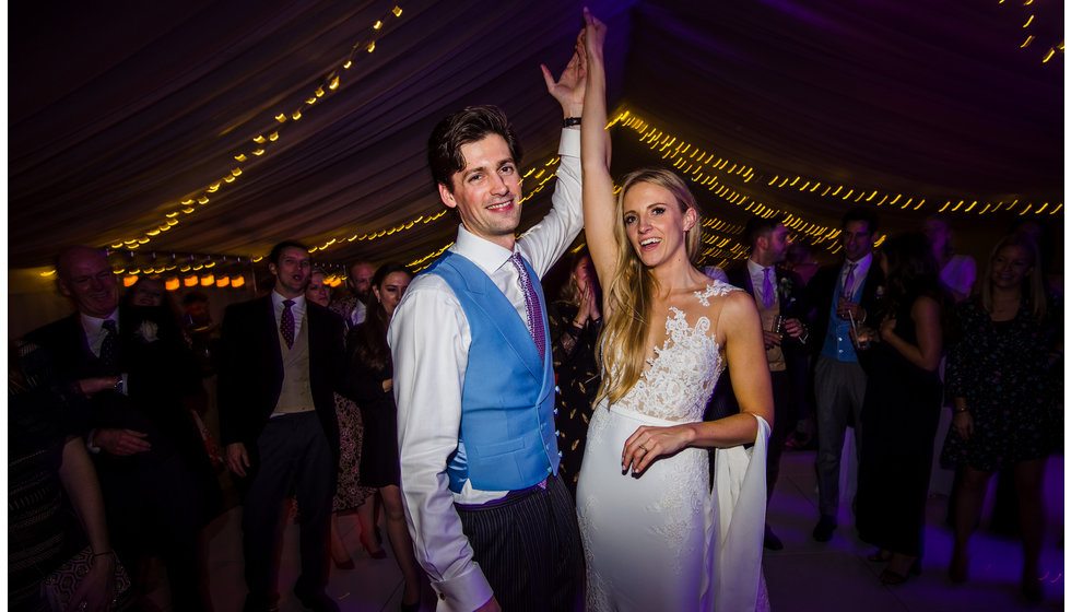 The bride and groom on the dancefloor.