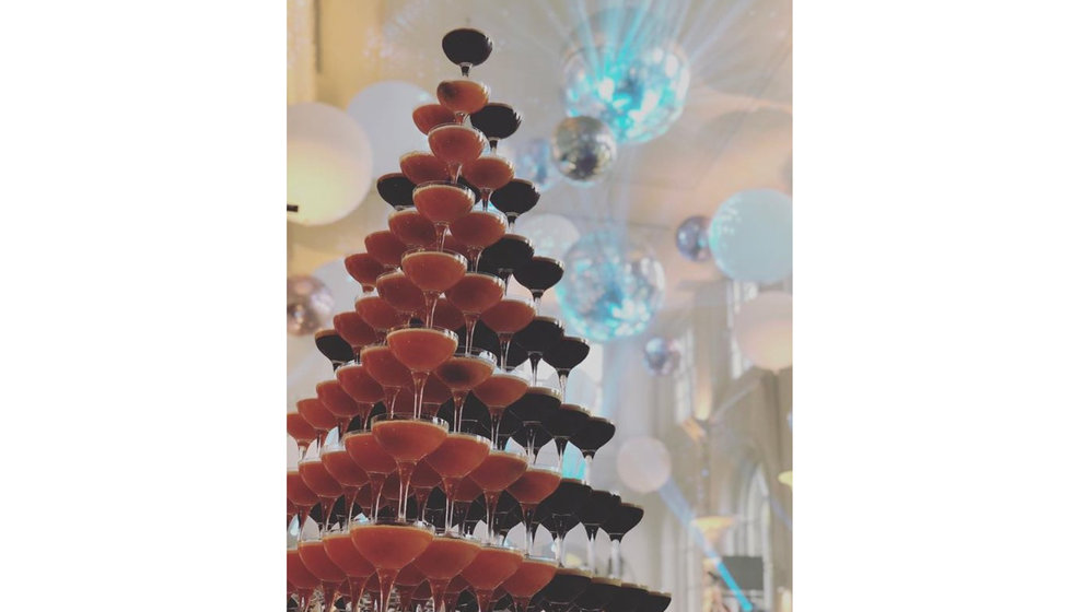 A tower of cocktails at an event created by The Cocktail Service.