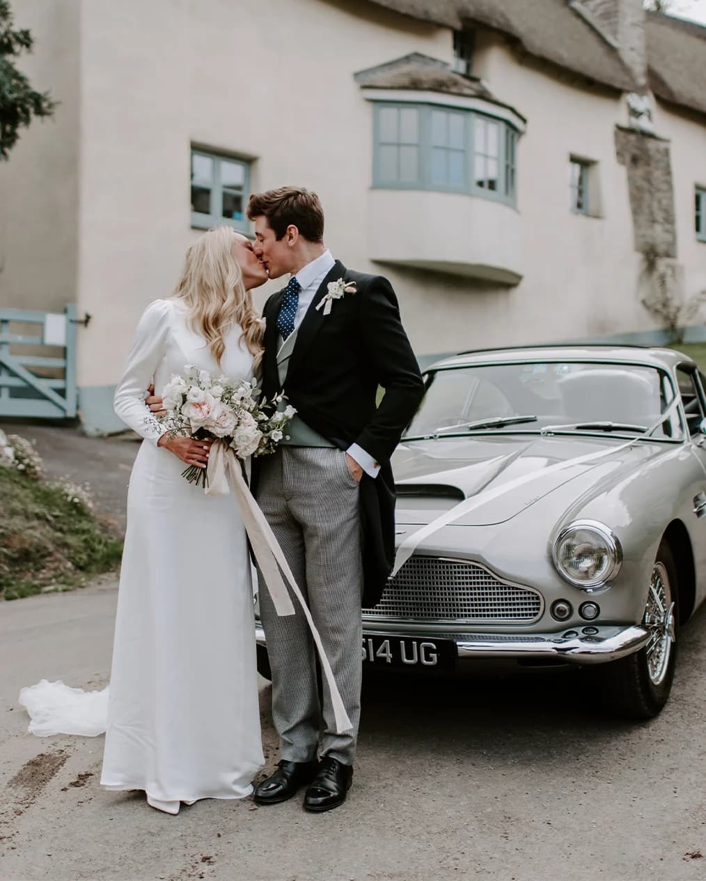 bride and groom english wedding car