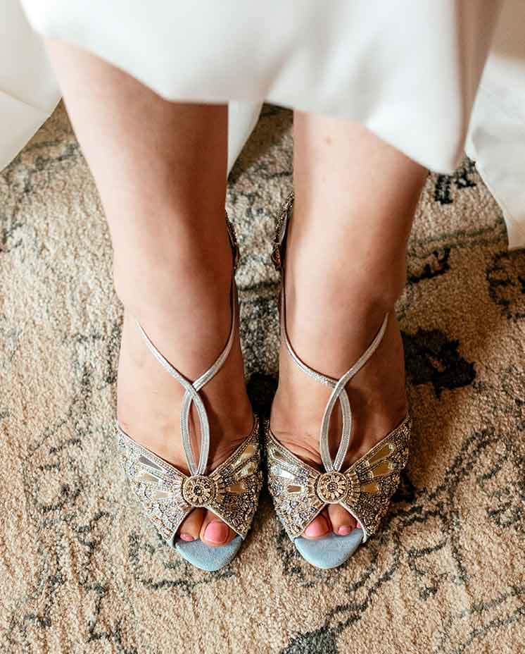 The wedding shoes of a bride getting married in Wiltshire, England