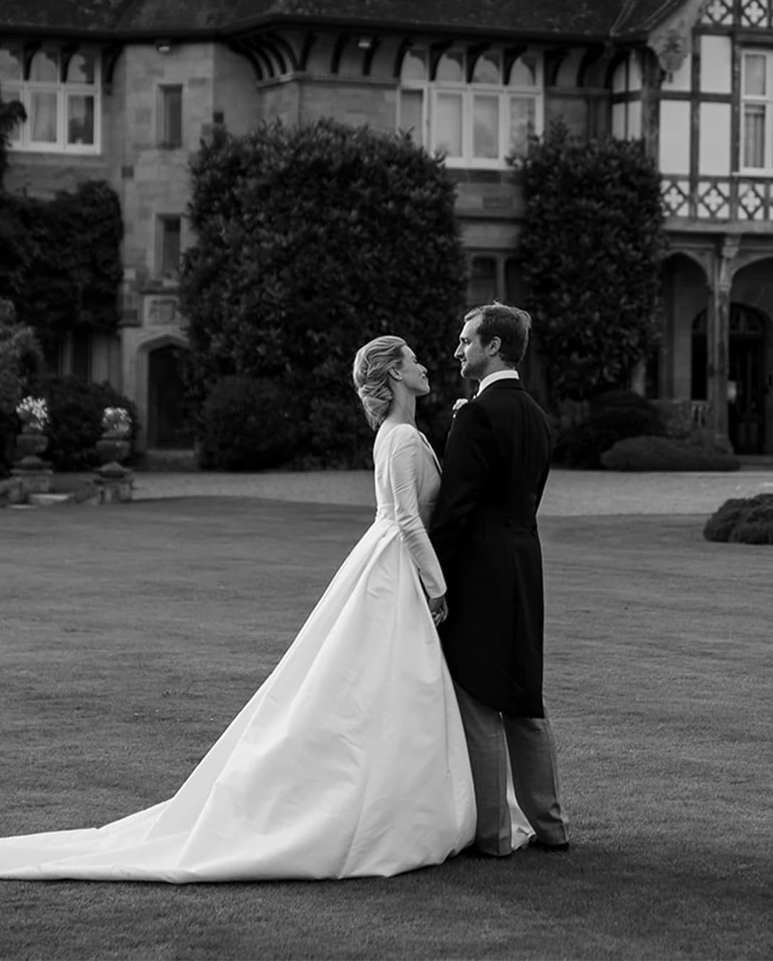 Bride and groom and their traditional English wedding
