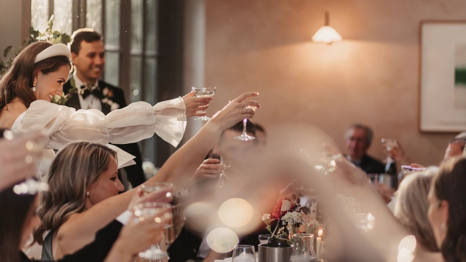 Bride gives a toast during autumnal wedding reception