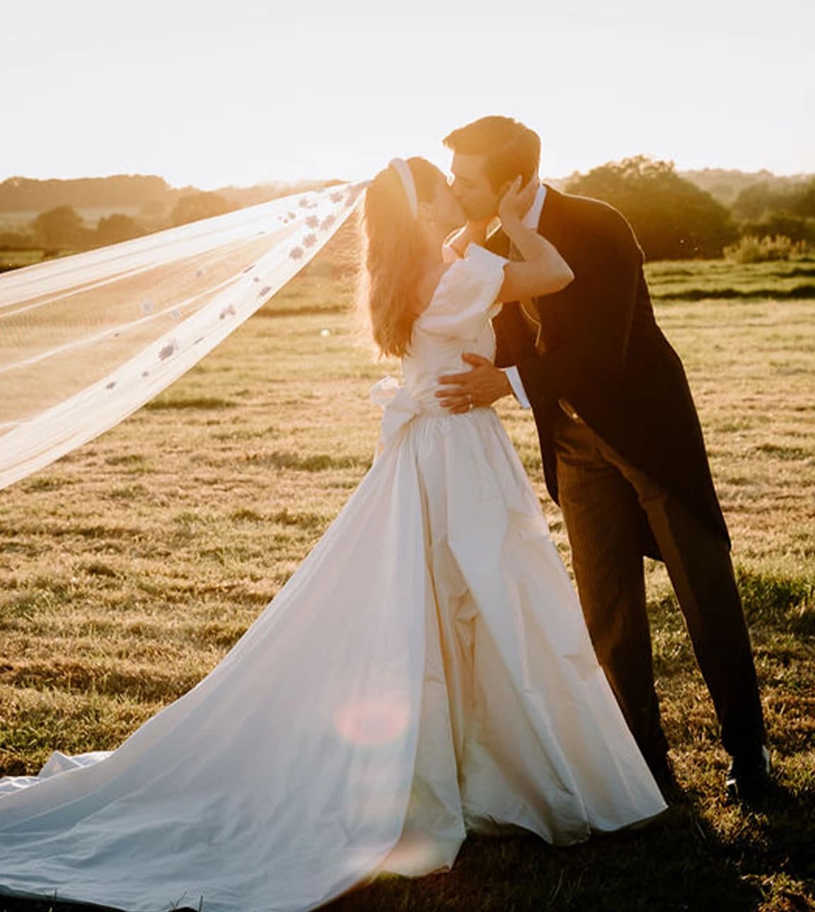 beautiful bride kissing the groom wedding day garden english wedding