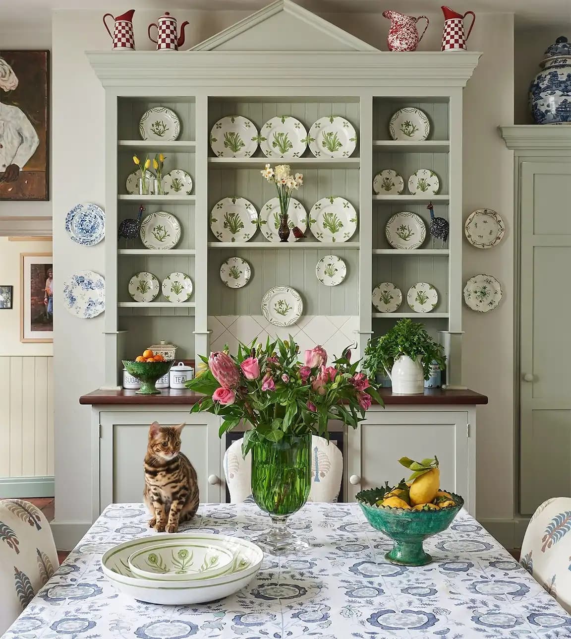Dining room with traditional cupboard features Penny Morrison tableware gifts