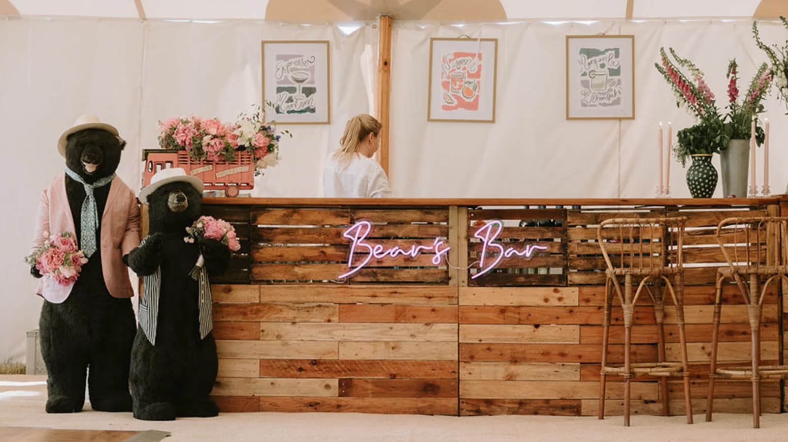 Bear themed marquee wedding wooden bar with neon lights.