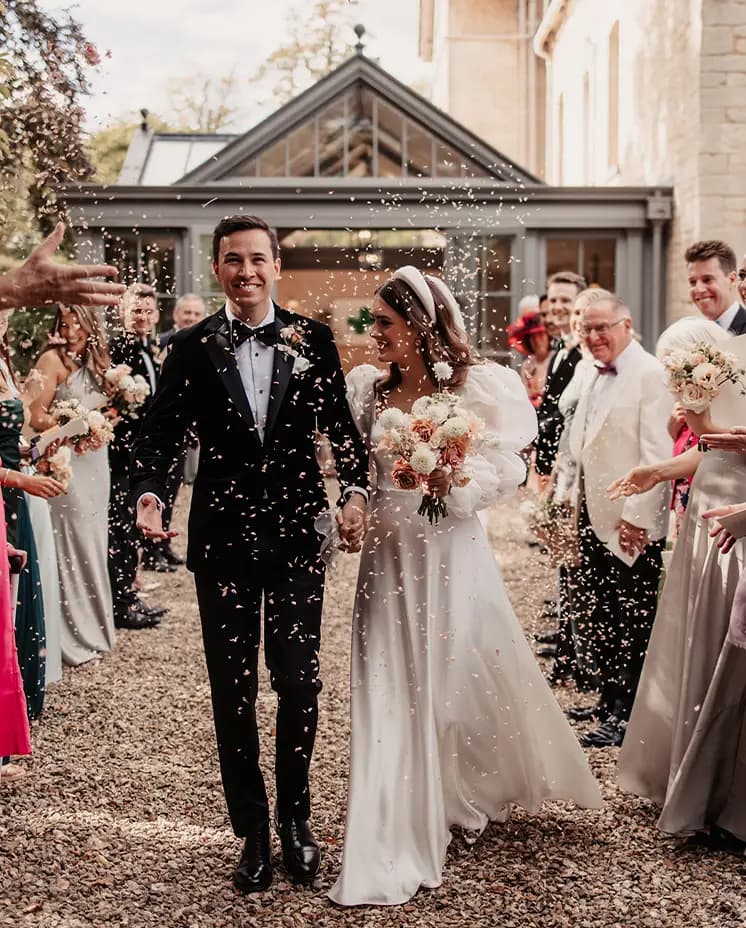 bride and groom walking the aisle celebration