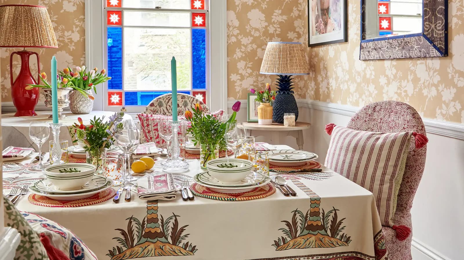 Dining room table displays colourful Penny Morrison tableware