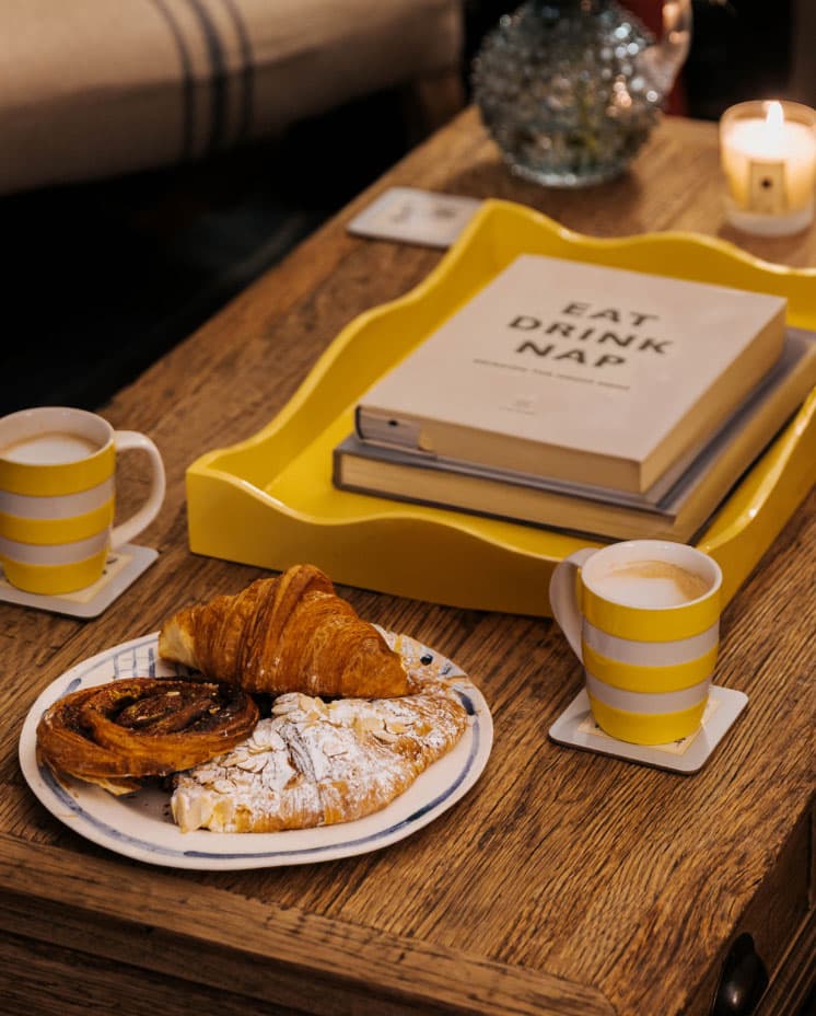 Coffee and pastry being served on table during the gift list appointment in The Wedding Present Company showroom