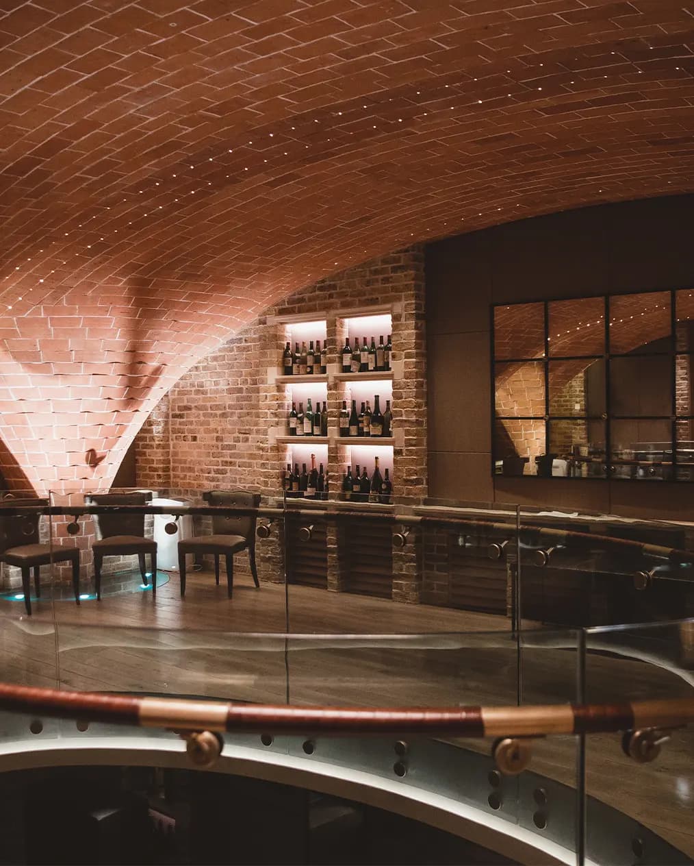 Chic wine cellar reception venue with vaulted ceiling