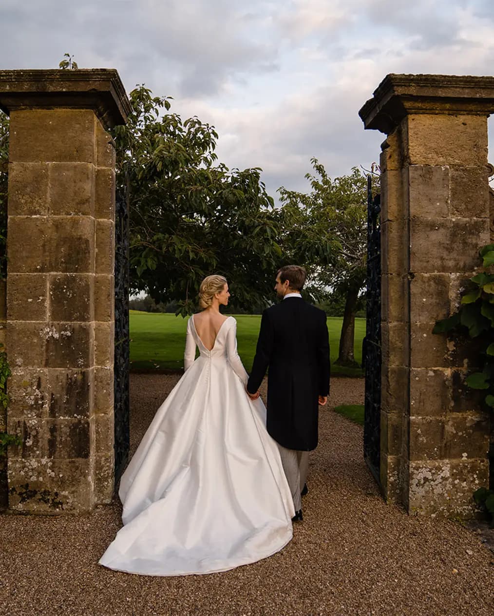 bride and groom walking and their beautiful wedding 