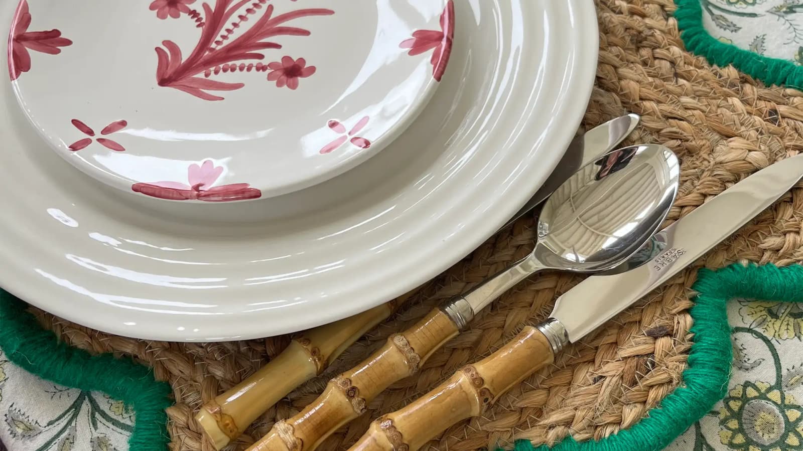A colourful summer dinner party tablescape by Georgia Hearm features luxury tableware presents from The Wedding Present Company