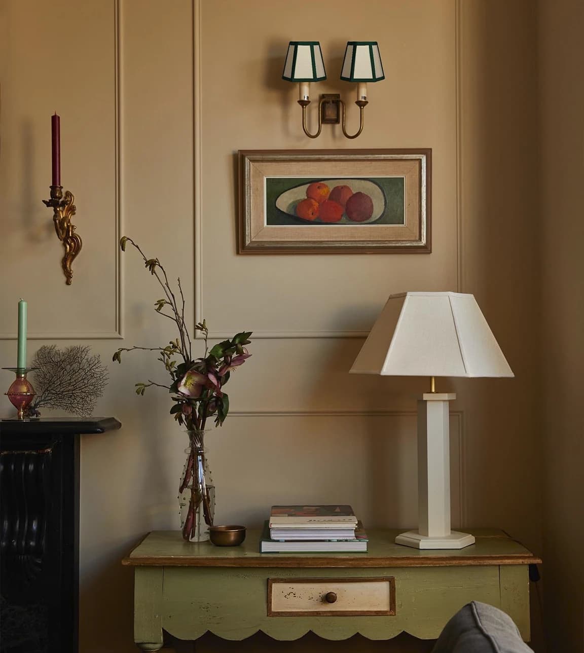 Issy Granger table lamp and vase are placed on a stylish traditional console 