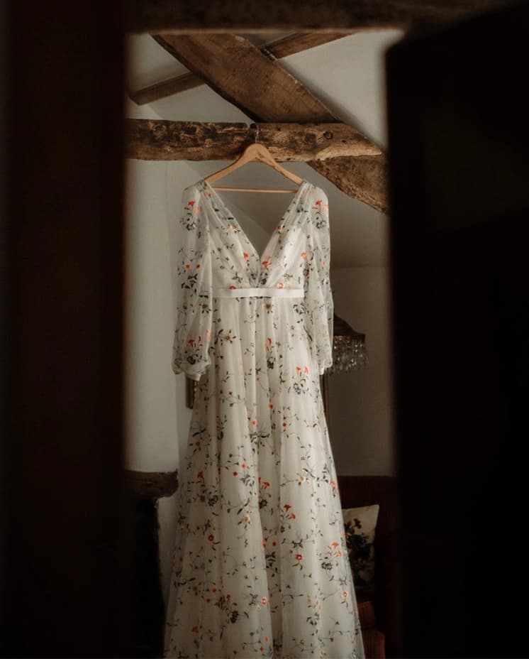 'Iris' Sassi Holford wedding dress hanging up