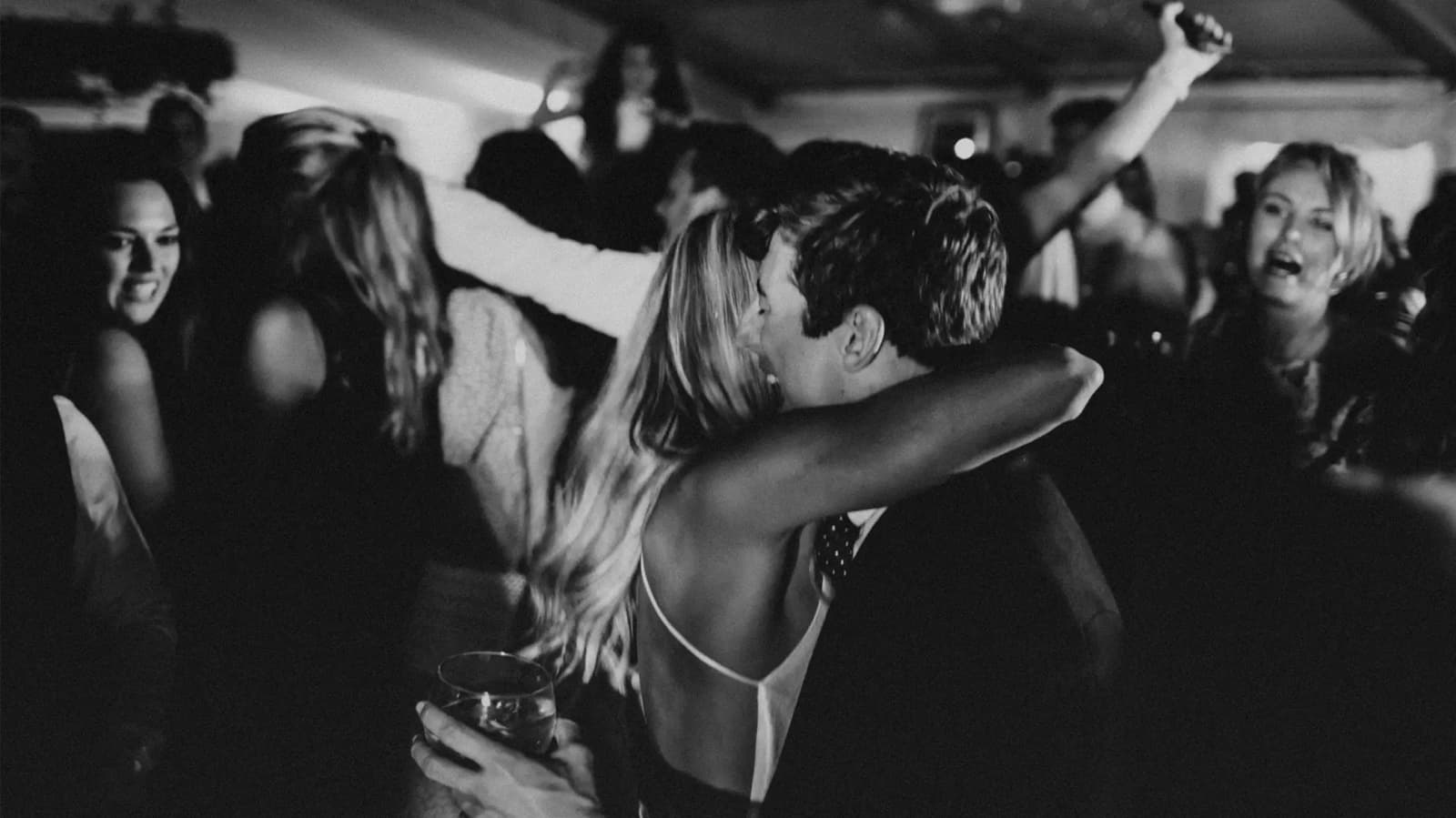 Bride and groom having fun dancing and singing