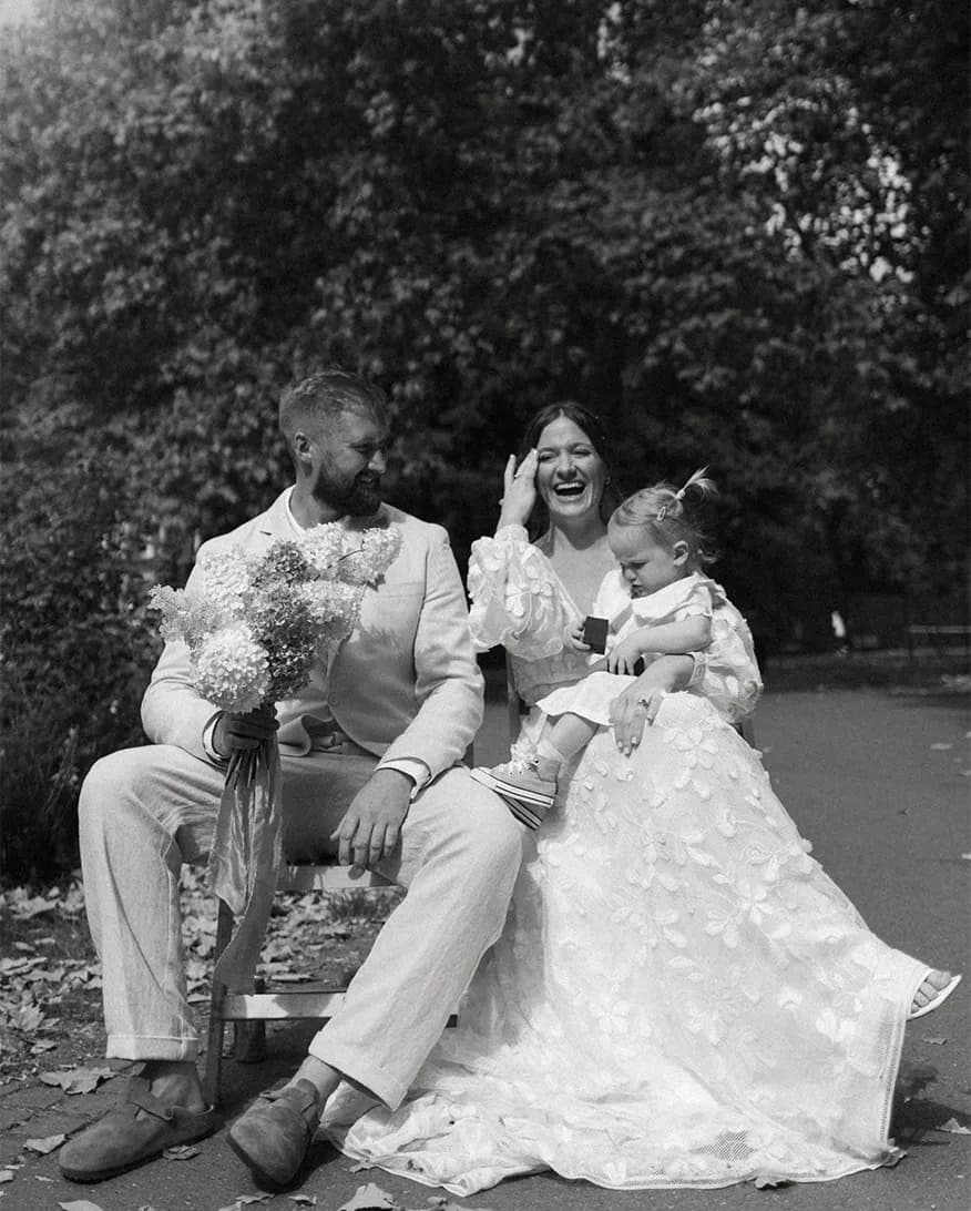 Bride and groom and their child
