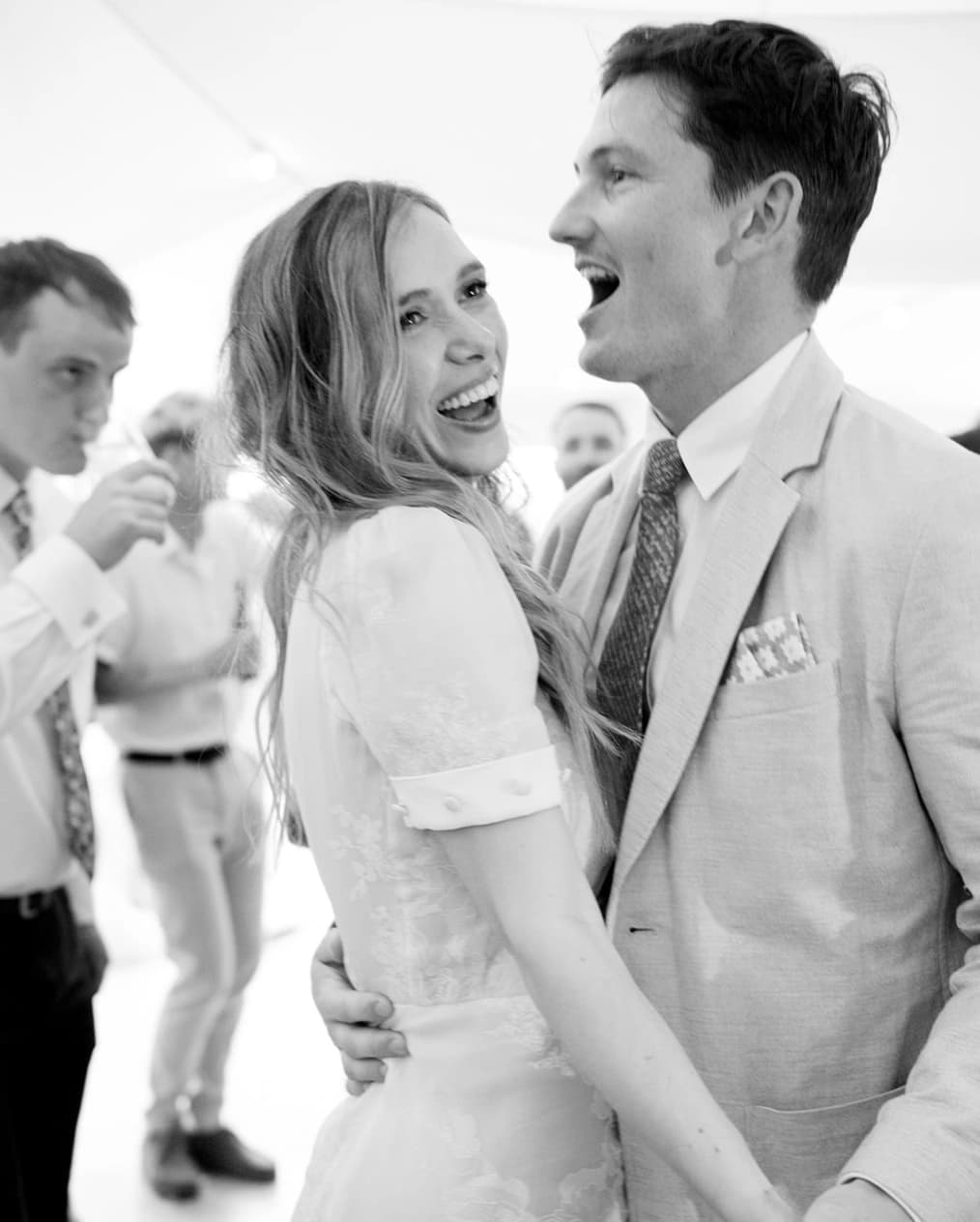 bride and groom having fun dance music party