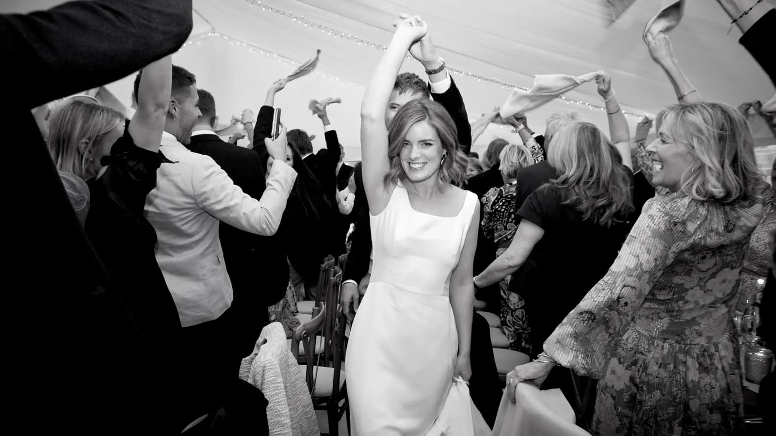 Bride and groom having fun at their wedding party dance and music