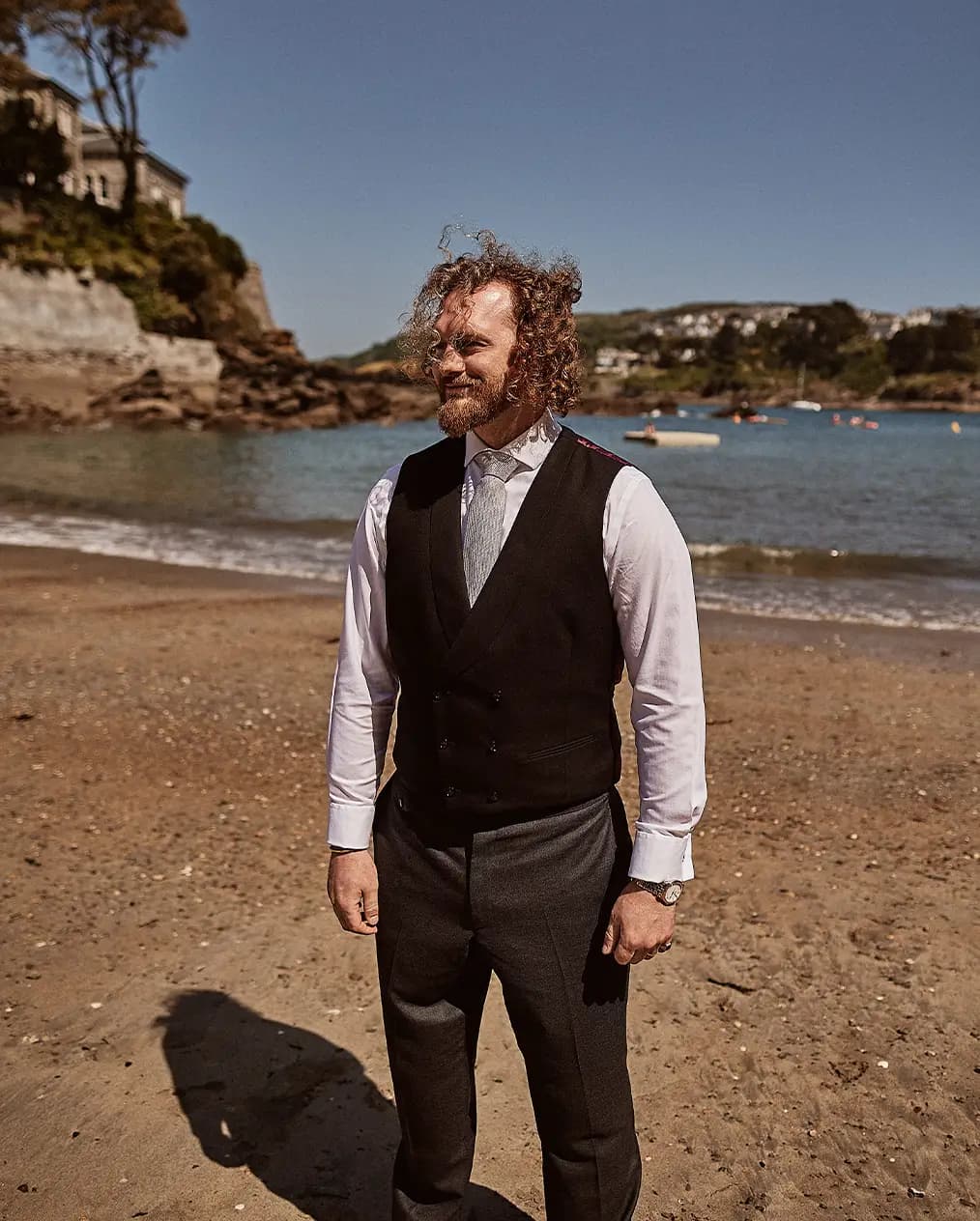 groom fashion suit and tie Cornwall beach