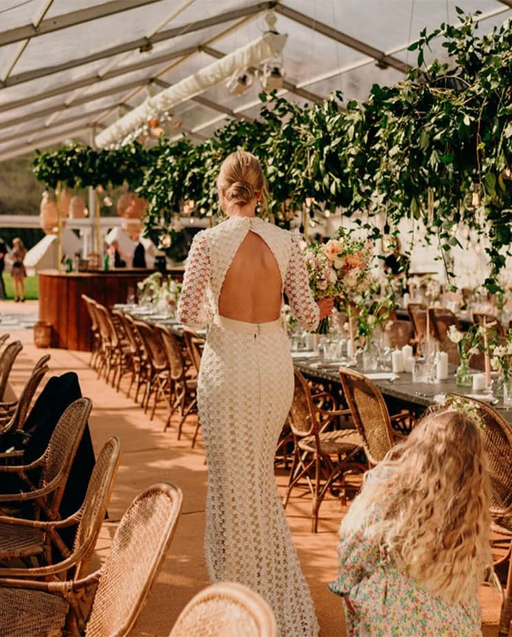 bride and her wedding decorations table arrangement