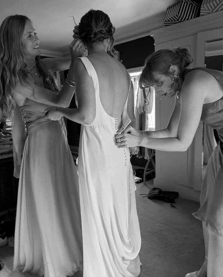 wedding inspiration bride with her bridesmaids wedding dress
