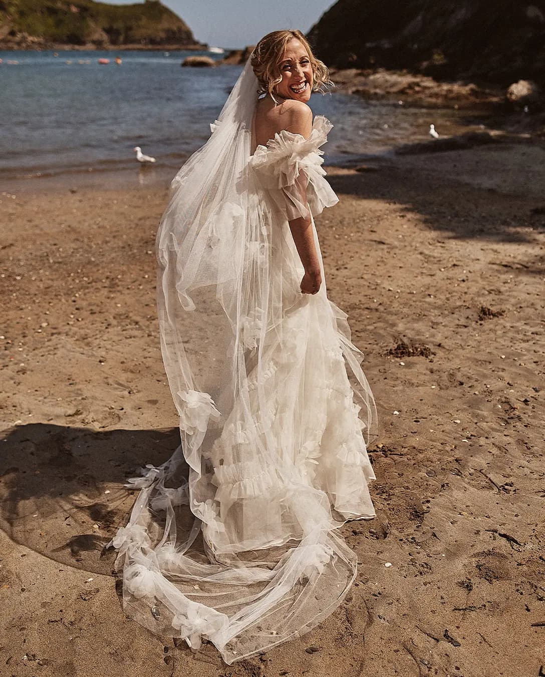 bride beautiful wedding dress Cornwall sunny beach