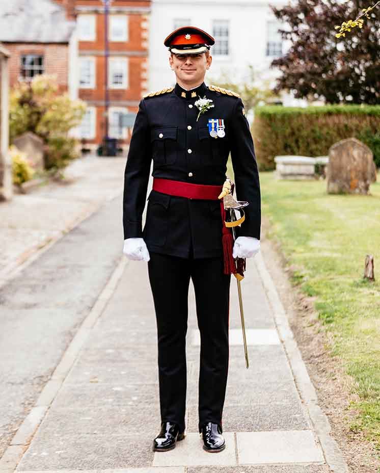 Groom's outfit at English wedding in Wiltshire, groom wearing military clothing 