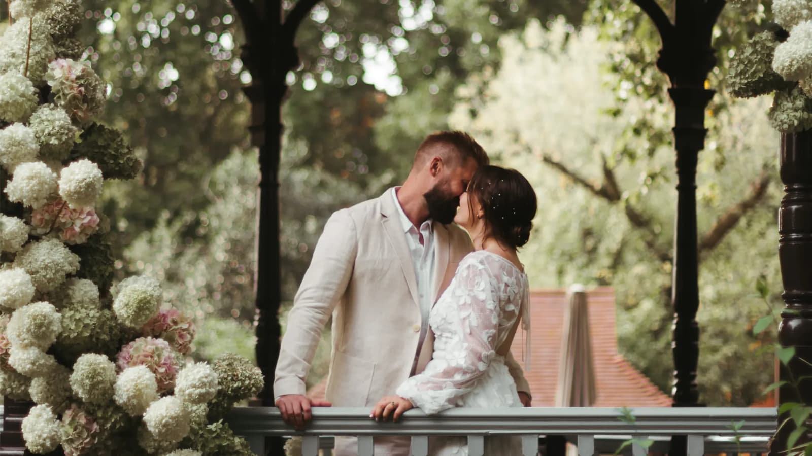 Couple bride and groom sharing a magical kiss