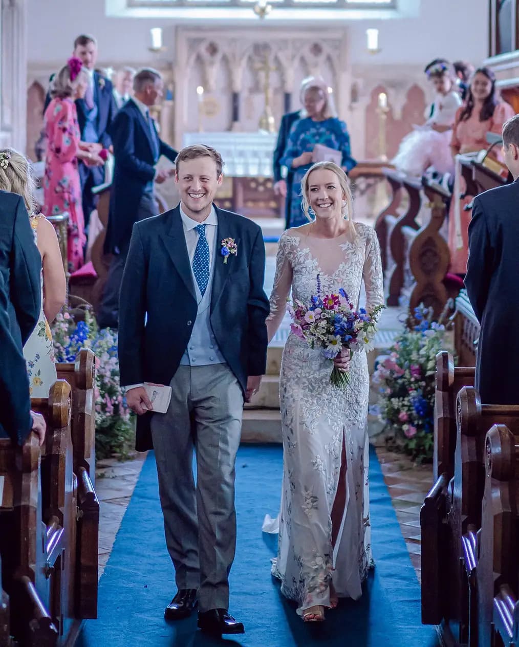 bride and groom walking at the church traditional wedding
