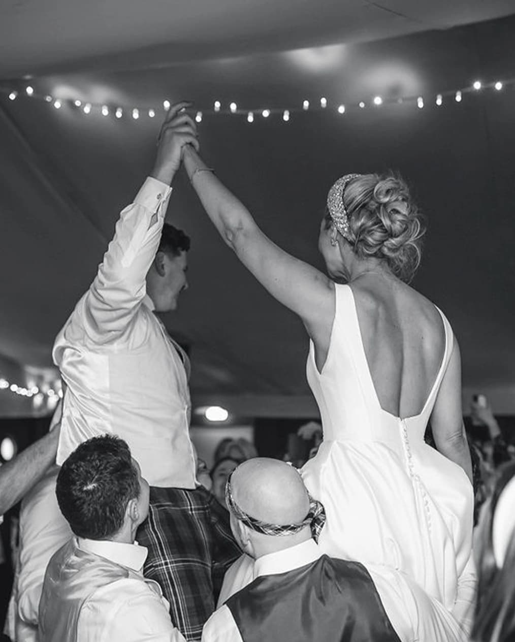 bride and groom having fun wedding party