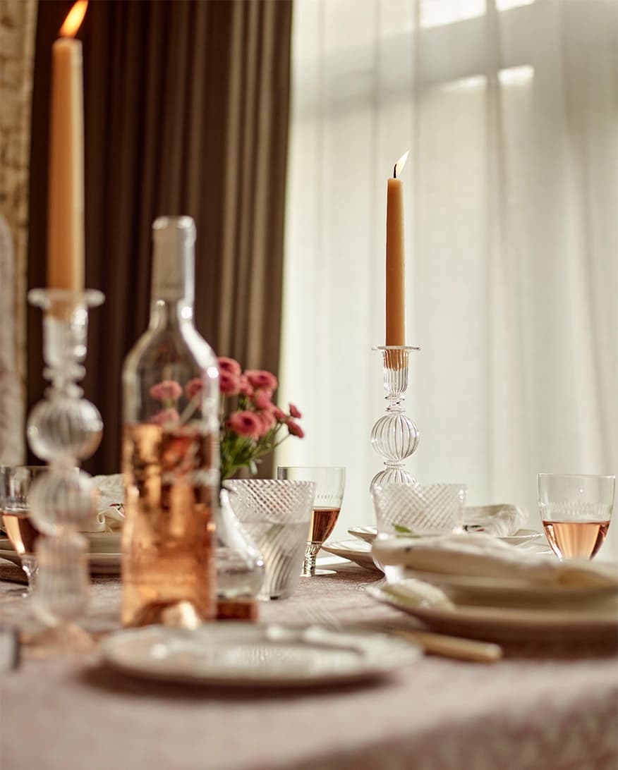 Luxurious pink table setting featuring a variety of wine glasses from The Wedding Present Company.