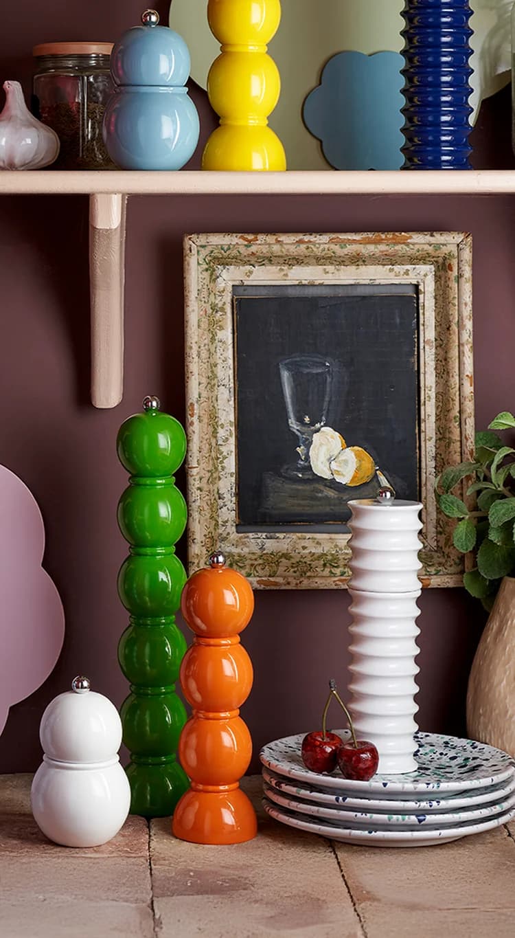 A kitchen counter with salt and pepper mills from Addison Ross 