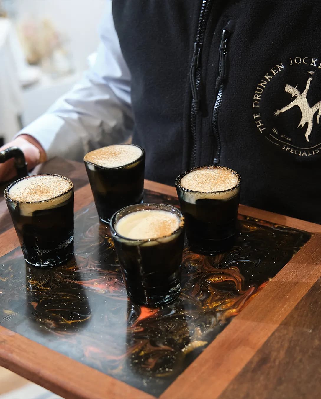 Wedding espresso martinis served by The Drunken Jockeys wedding bar team, during The Wedding Present Company showcase