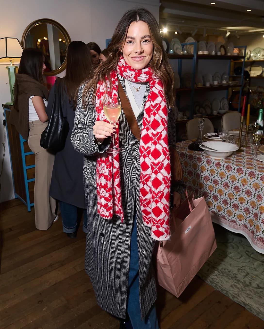 Emily Champion enjoying drink at The Wedding Present Company showcase