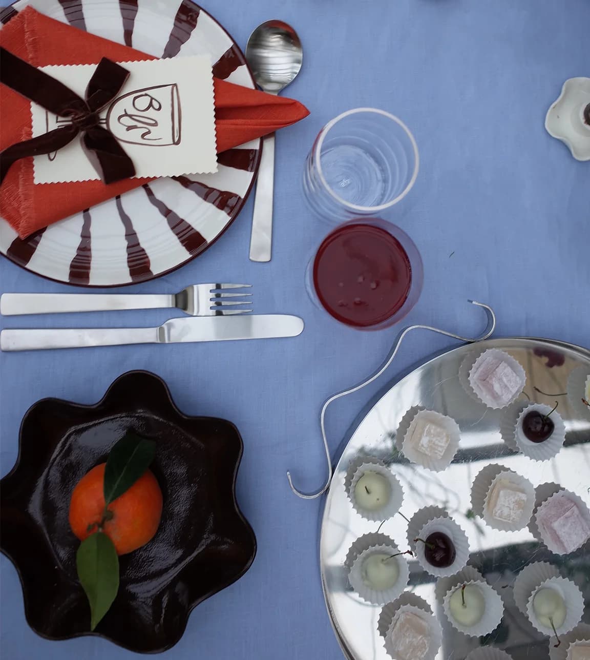 Laura Jackson's tablescape styling with eclectic serveware