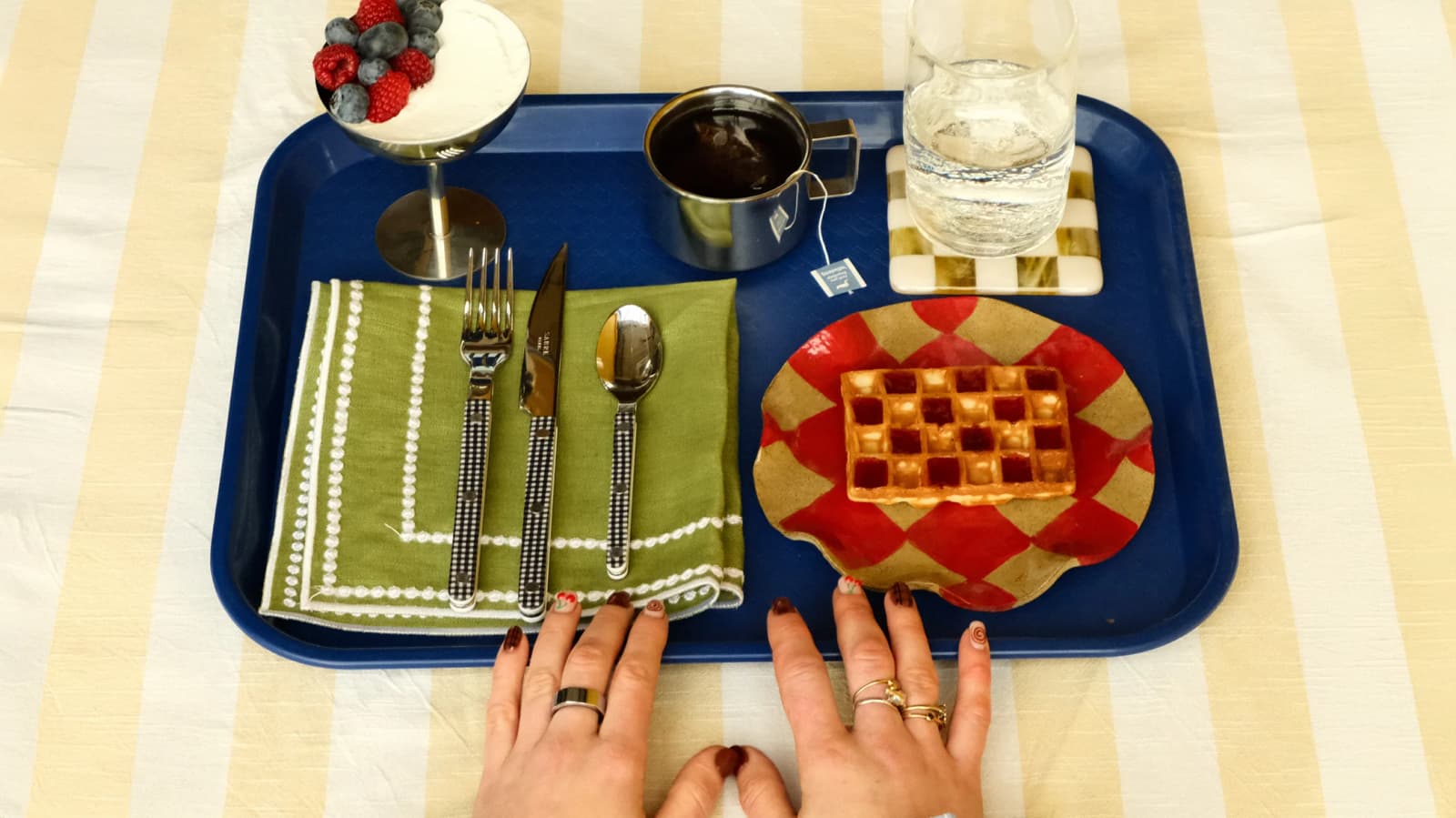 A tray on striped tablecloth, featuring Glassette tableware wedding gifts