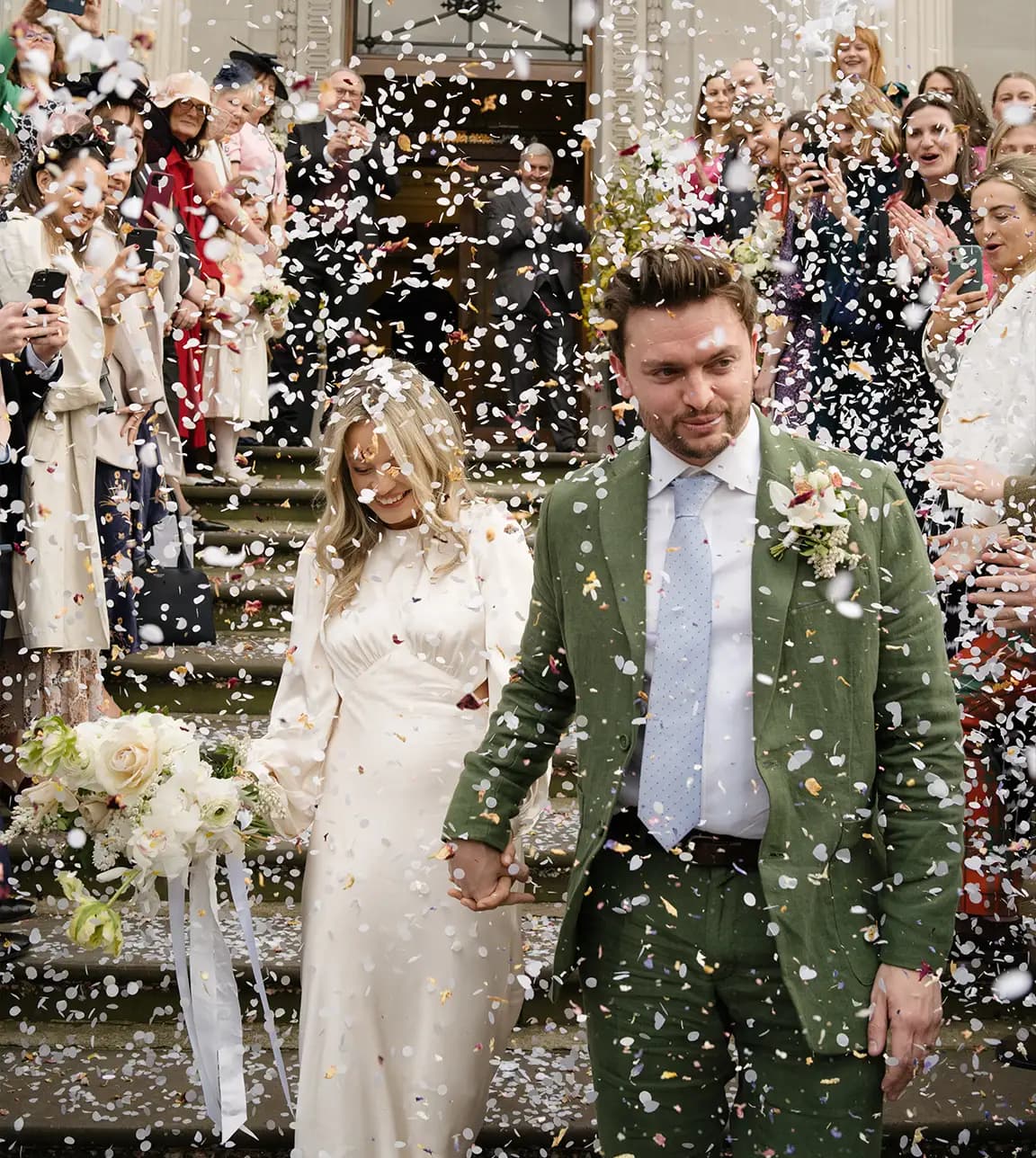 Bride and groom after their registry office wedding ceremony at Marylebone Town Hall