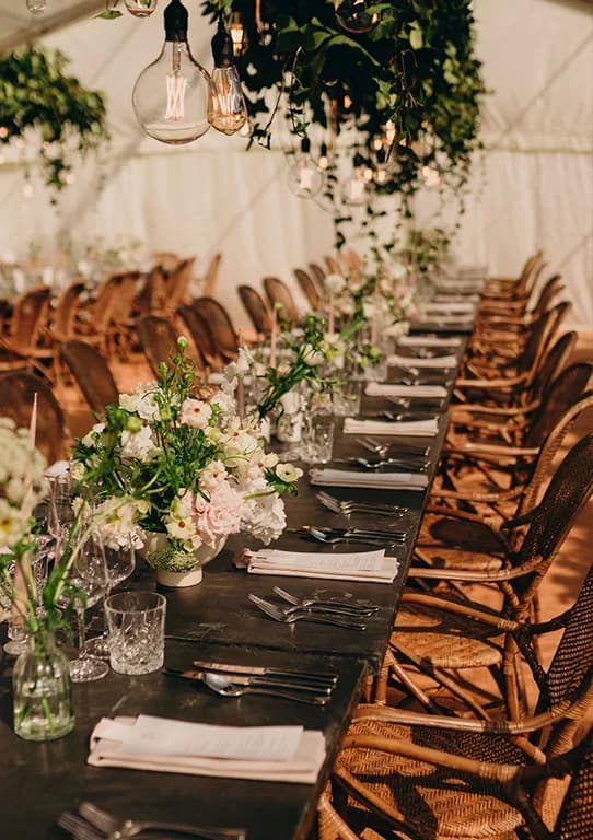 Wooden furniture with chic floral wedding table decor
