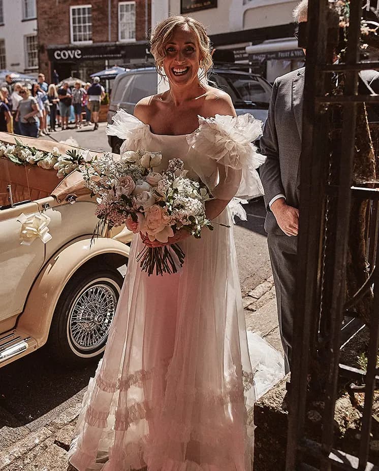 bride smiling vintage classy timeless vintage wedding car
