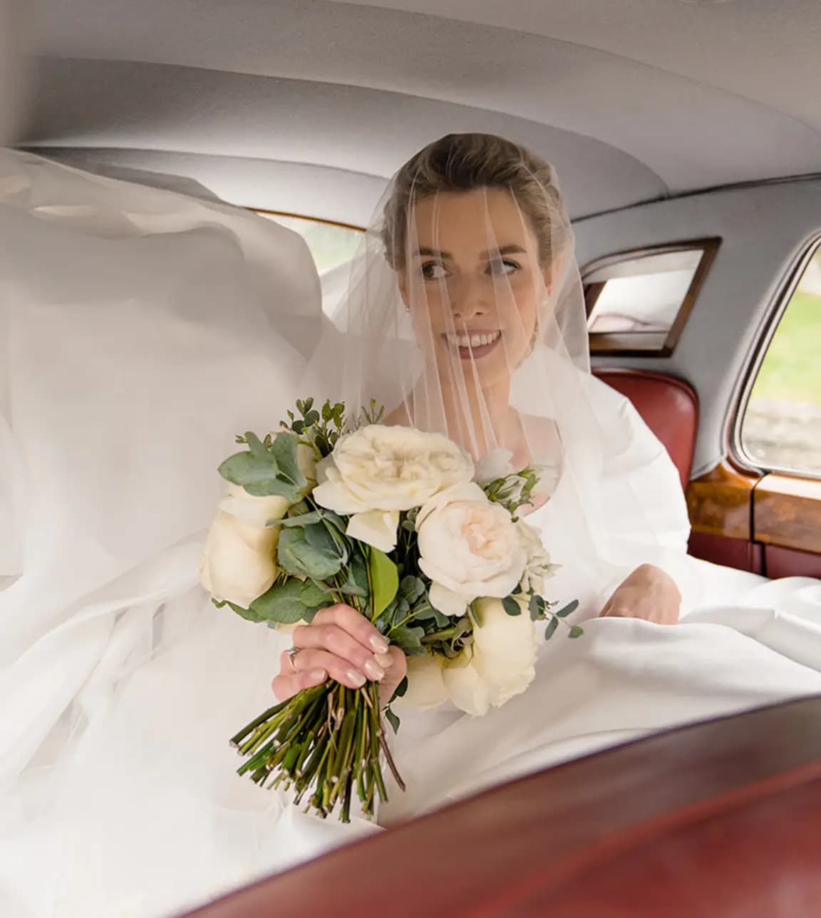 Bride waiting in the car, before her wedding ceremony