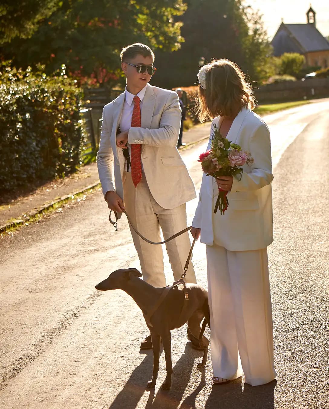 bride and groom wedding sunny day with their dog