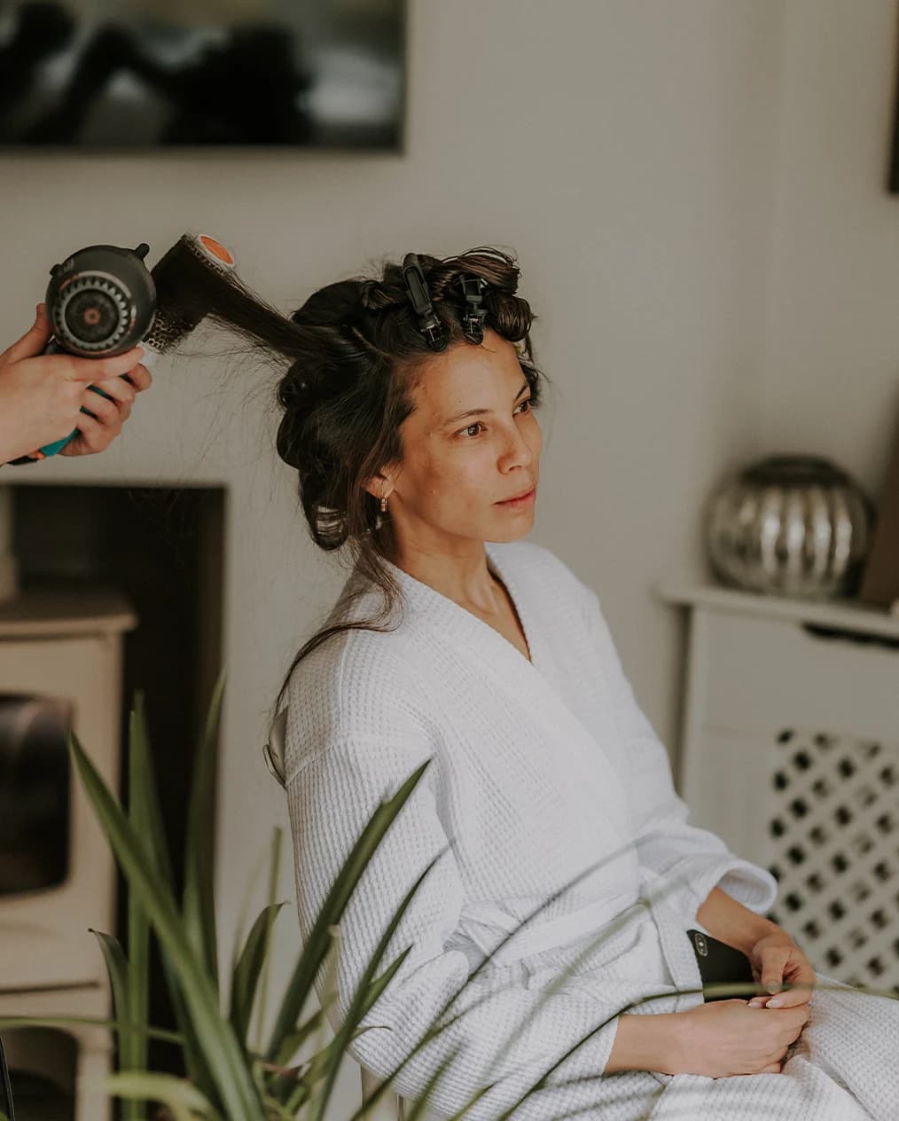 bride gettin ready for her wedding hairstyle sleek 
