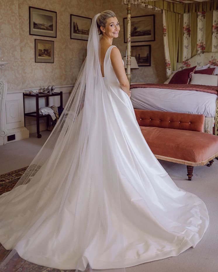 beautiful bride with her gorgeous wedding dress traditional ceremony
