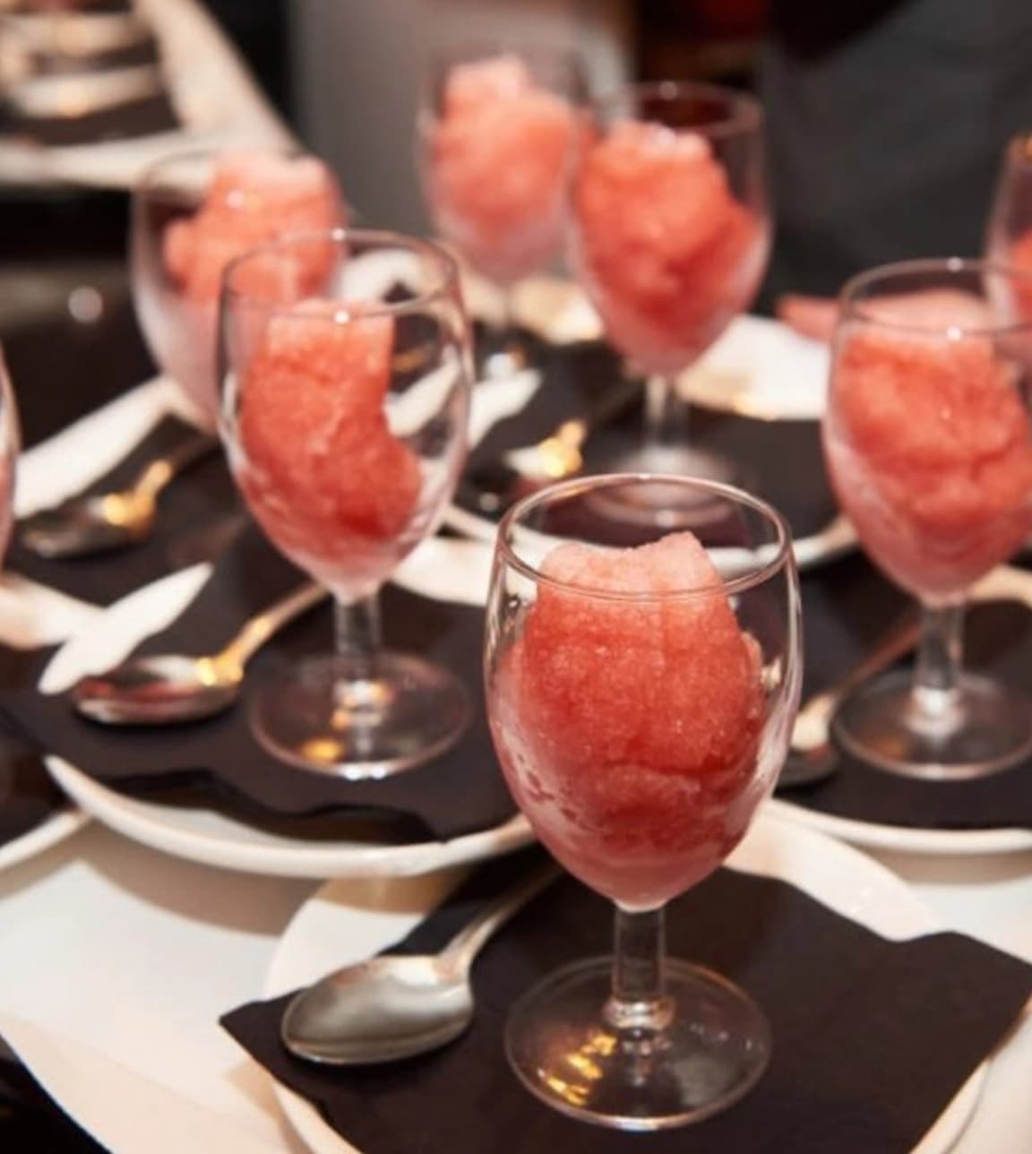 Watermelon vodka shots served as an amouse bouche at wedding breakfast