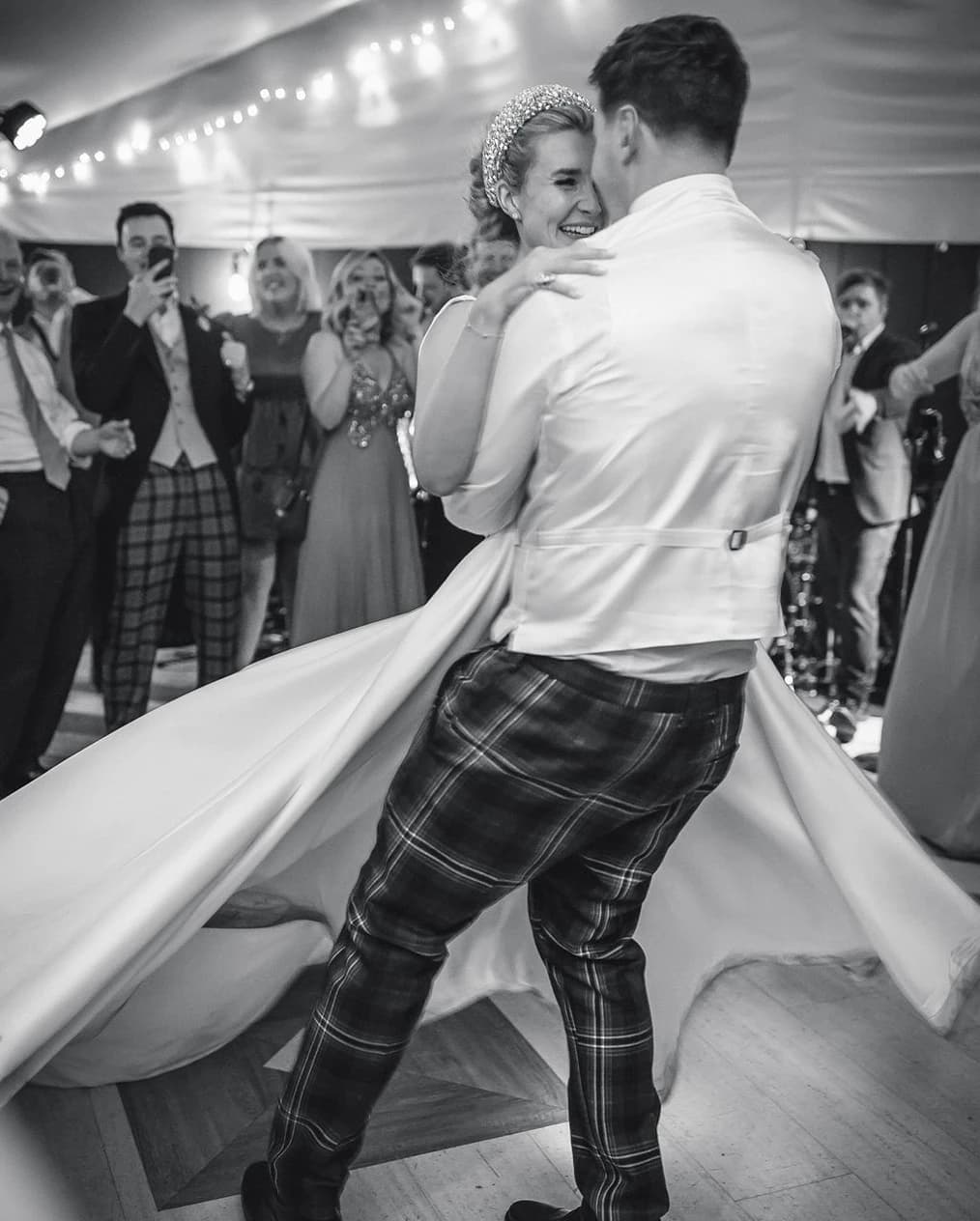 bride and groom dancing at wedding party