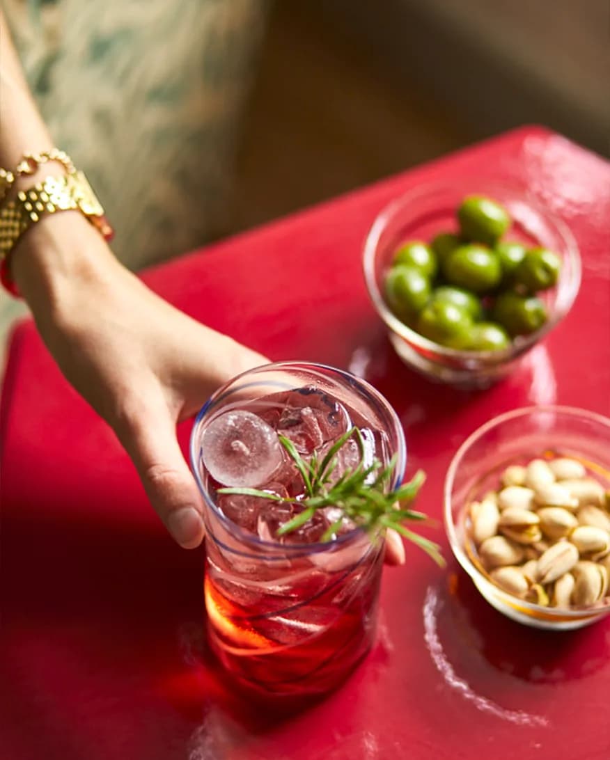 Nibbles and cocktails served in handcrafted Issy Granger glassware