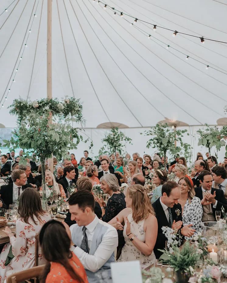 guest seated enjoying the wedding and decorations
