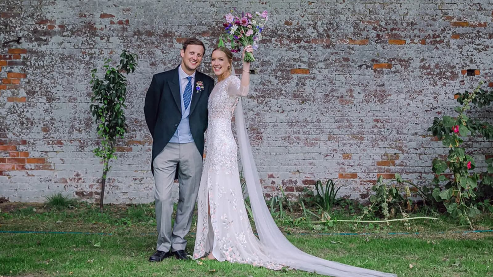 bride and groom holding hands