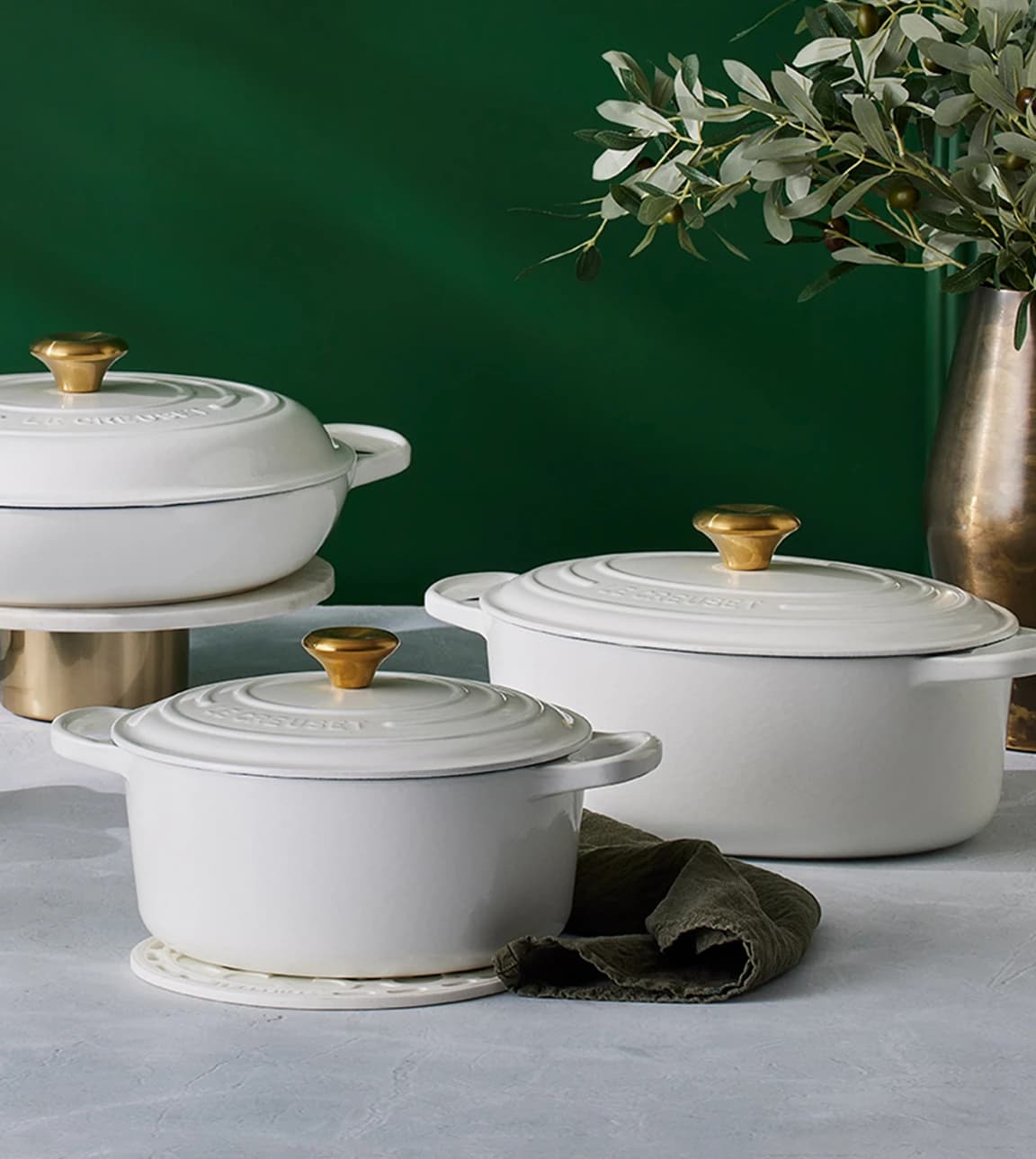 A mix of Le Creuset casseroles in Rhone colourway