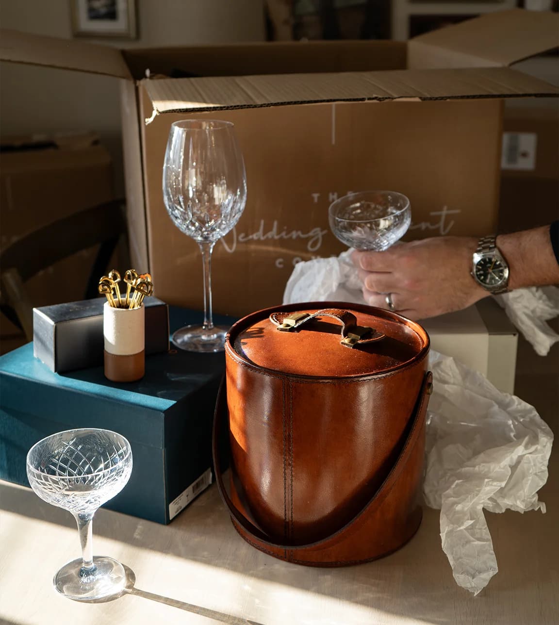 Unpacking elegant glassware wedding gifts from The Wedding Present Company.